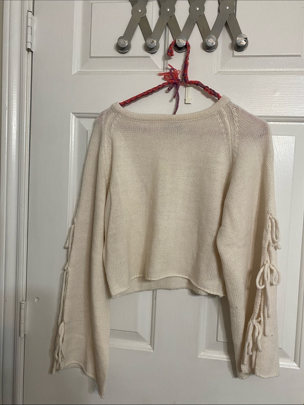 Off-Shoulder Cream Knit Sweater with Sleeve Tie Detail